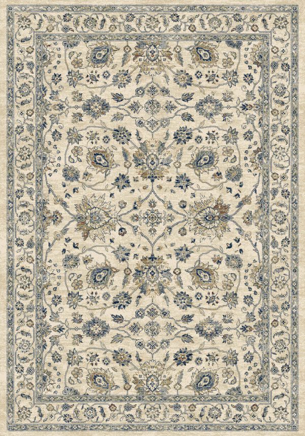 Traditional patterned rug cream background with blues, greys and browns