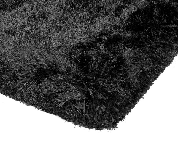 Heavy weight shaggy rug in a strong black