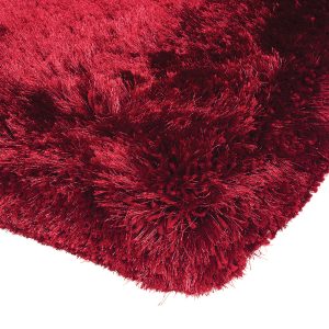 Heavy weight shaggy rug in a rich red