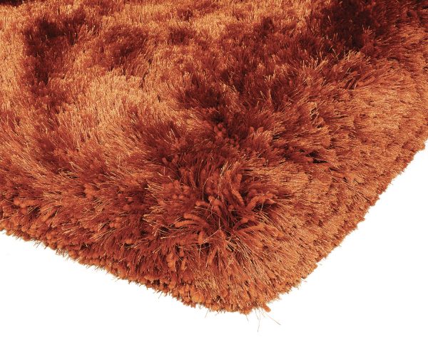 Heavy weight shaggy rug in a strong orange/rust colour