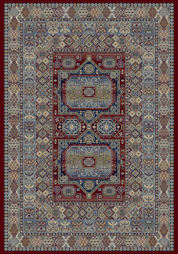 Heavily patterned traditional rug with blues creams and golds on a red background