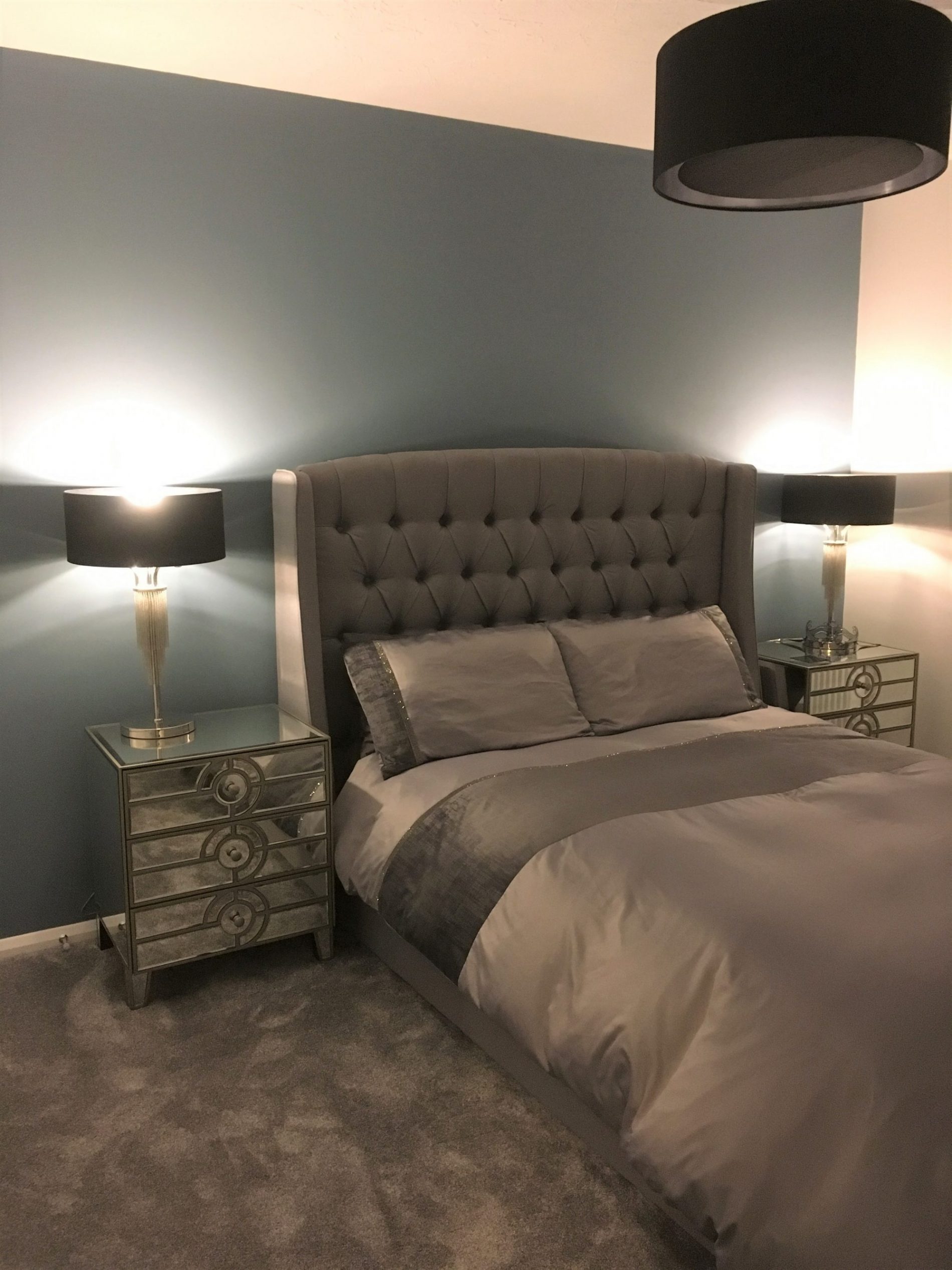 Grey Bedroom with Blue Wall
