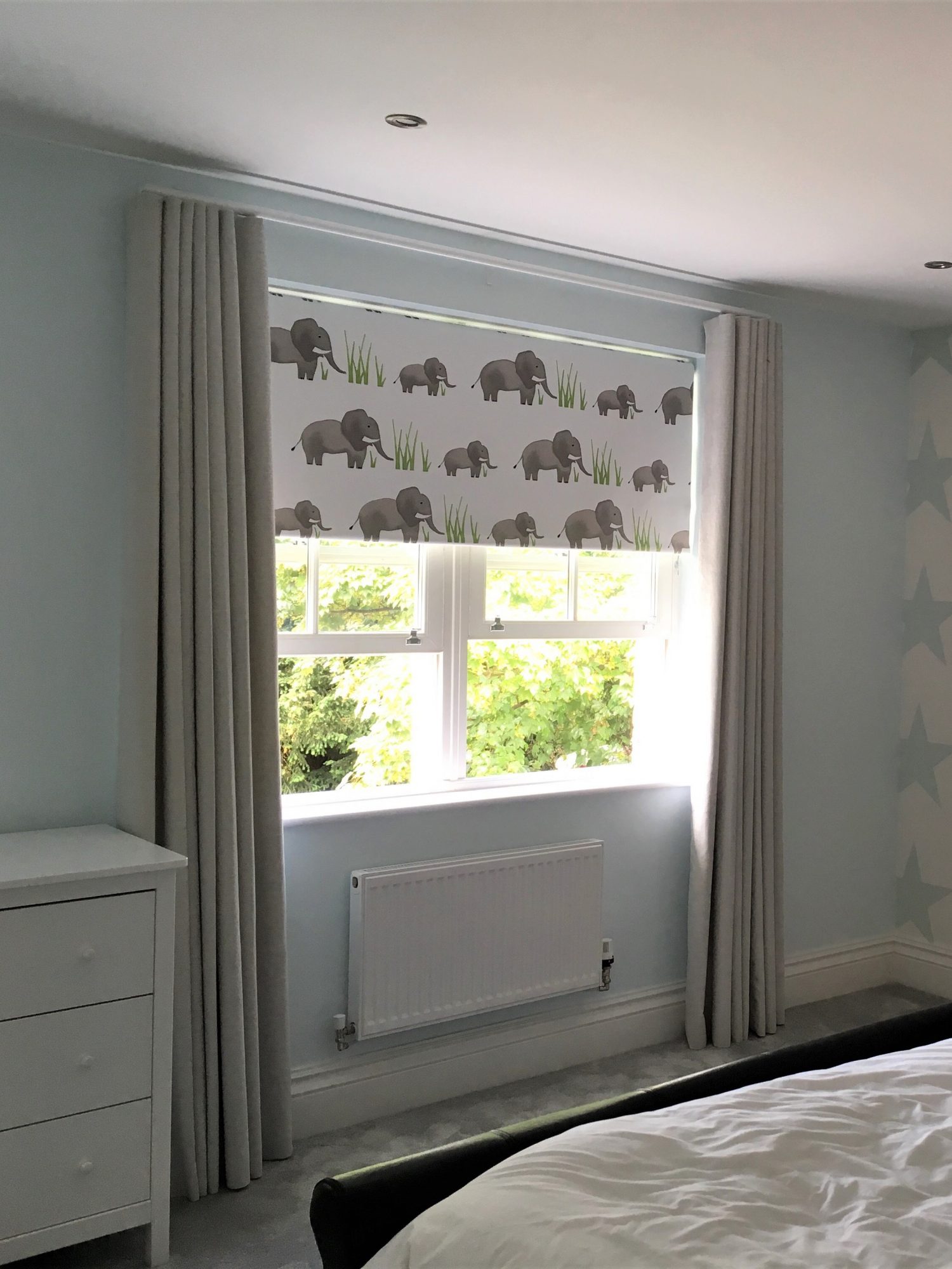 Elephant Roller Blind and Cream Wave Curtains