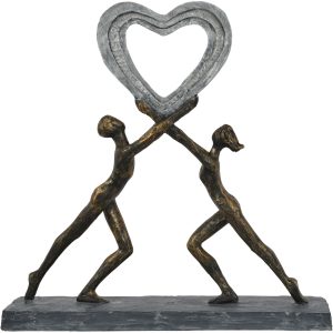 Uplifting love couple heart sculpture